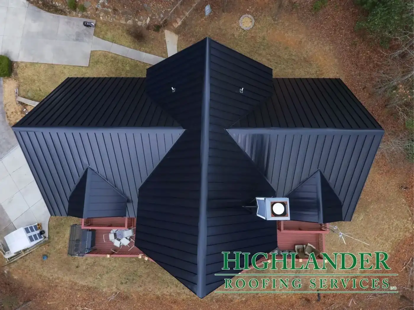 Standing seam metal roof on a Western North Carolina mountain home — Highlander Building Services